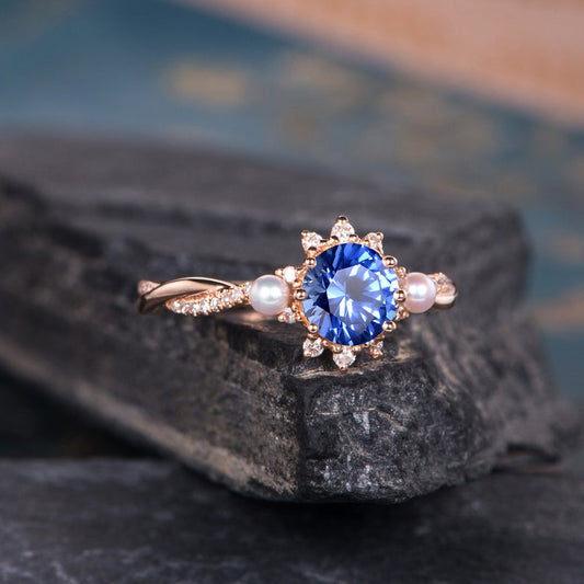 The Isla — Round Lab Sapphire & Pearl Halo Ring