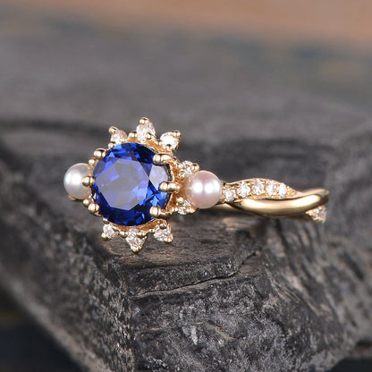 The Isla — Round Lab Sapphire & Pearl Halo Ring